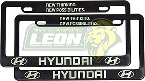 PORTAPLACAS NEGRAS GRABADAS HYUNDAI LETRAS FLUORESCENTES (JGO. c/2 pzas.)